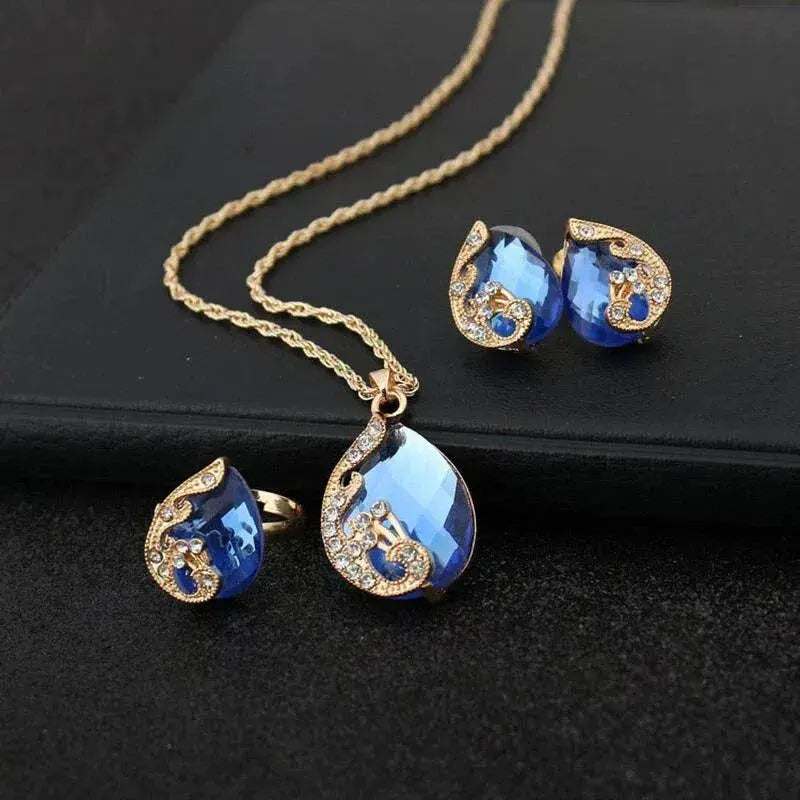 Blaue Kristall Halskette + Ohrring Set mit Blauen Kristallen in Gold