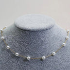 Elegante Goldene Halskette mit Perlen