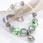 Elegantes Sterlingsilberarmband mit Grünem Kristall