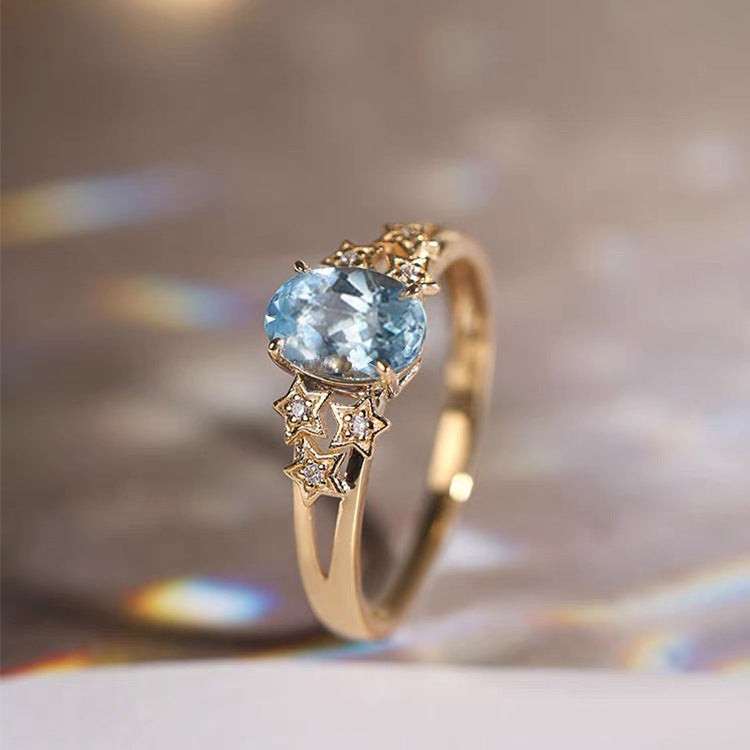 Exklusiver Goldring Mit Blauem Kristall