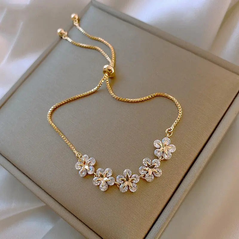 Kristall-Gänseblümchen-Armband in Gold
