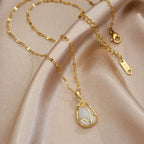 Elegante Goldene Tulpen Halskette mit Pinkem Kristall Anhänger